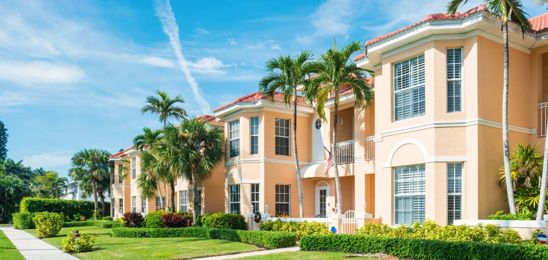 Tropical apartment complex with palm trees