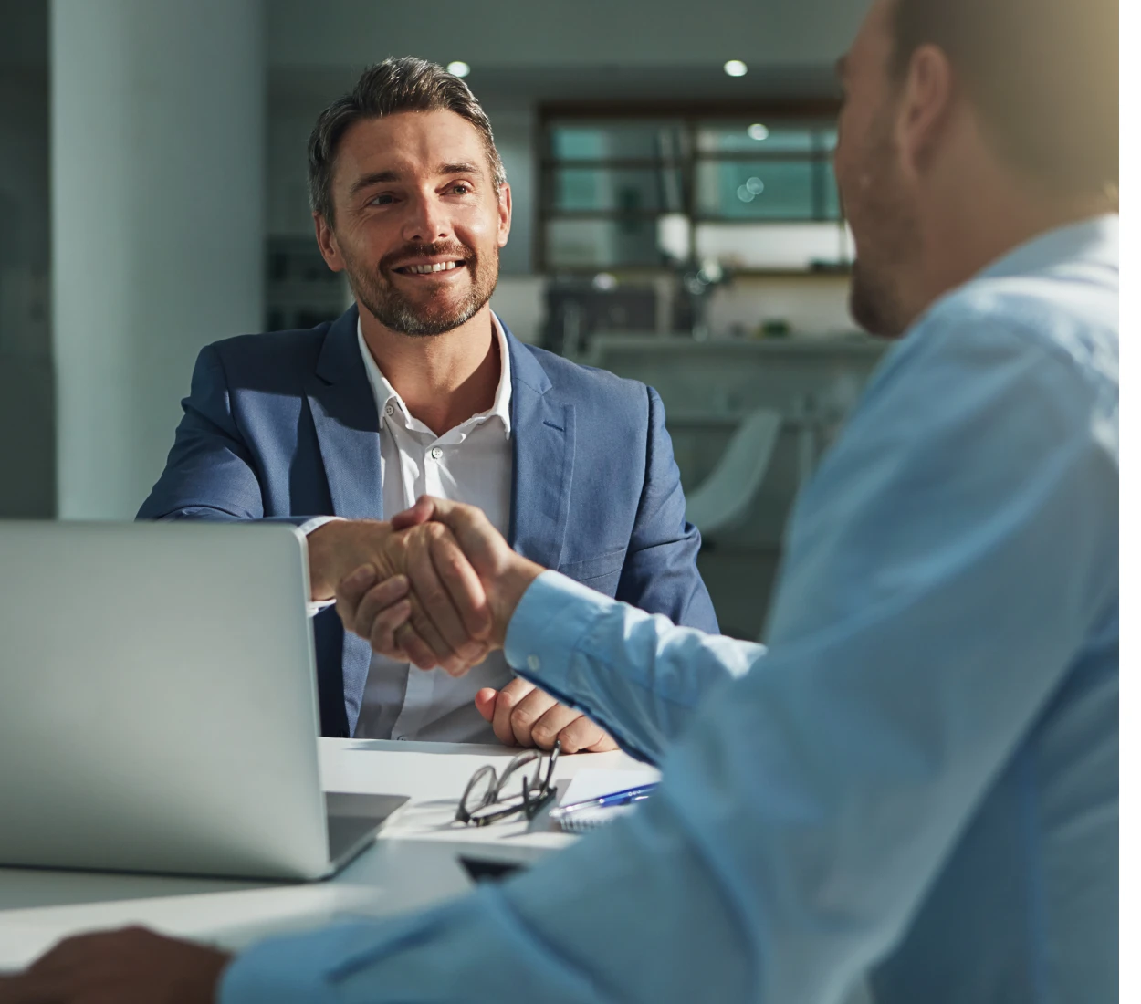 Office handshake between colleagues