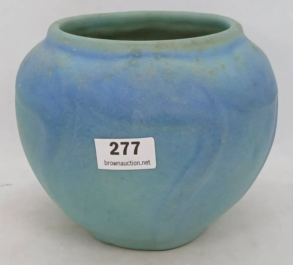 Blue ceramic vase with auction label