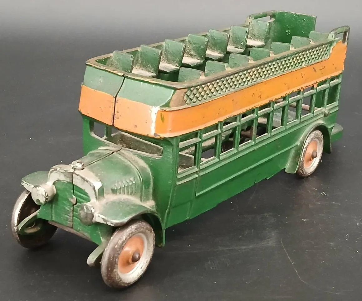 Old-fashioned toy bus on display