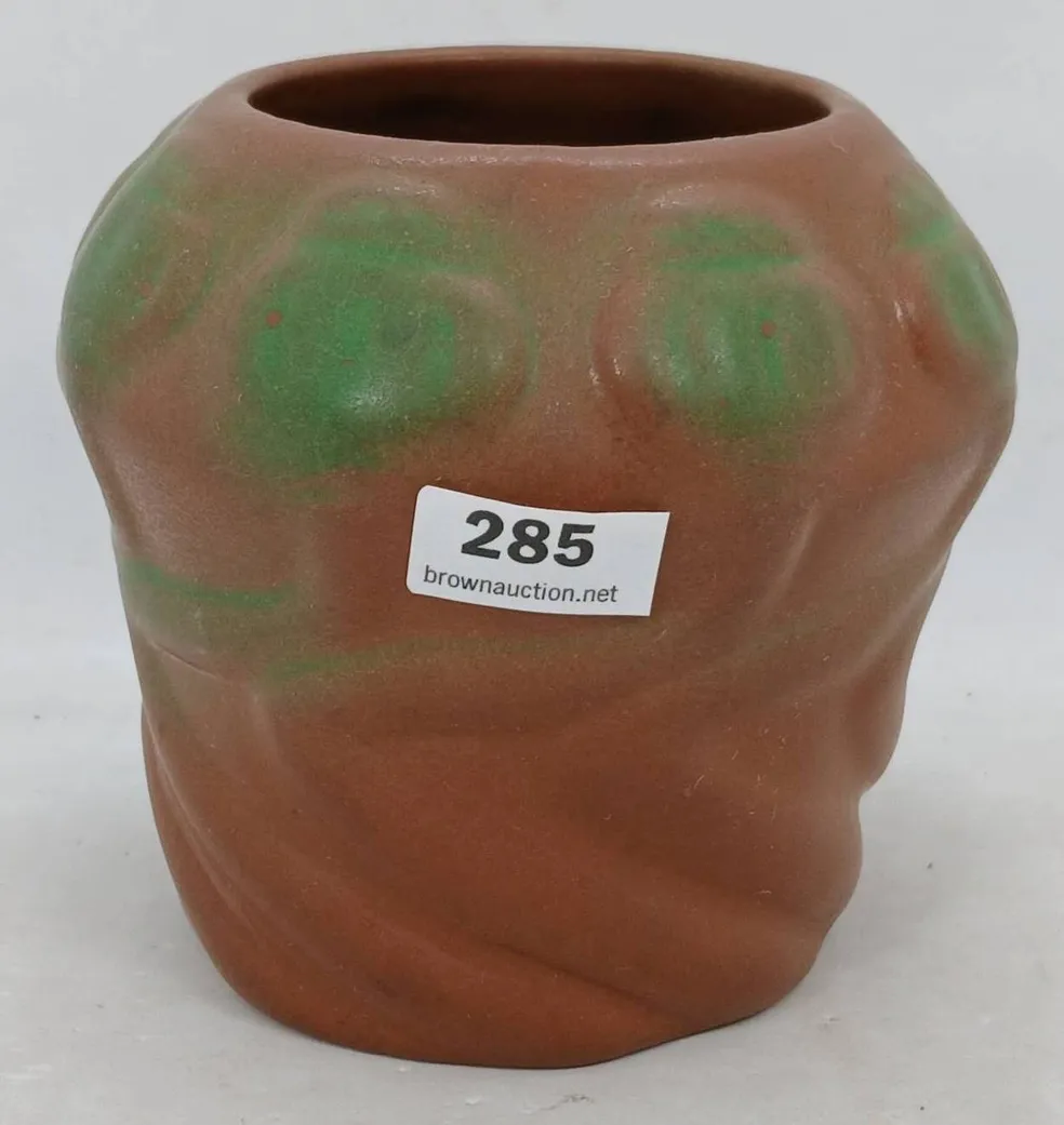 Rustic vase marked for auction sale